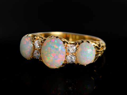 
                      
                        Firebrand - Fine Australian Opal Diamond 18k Trilogy Ring
                      
                    